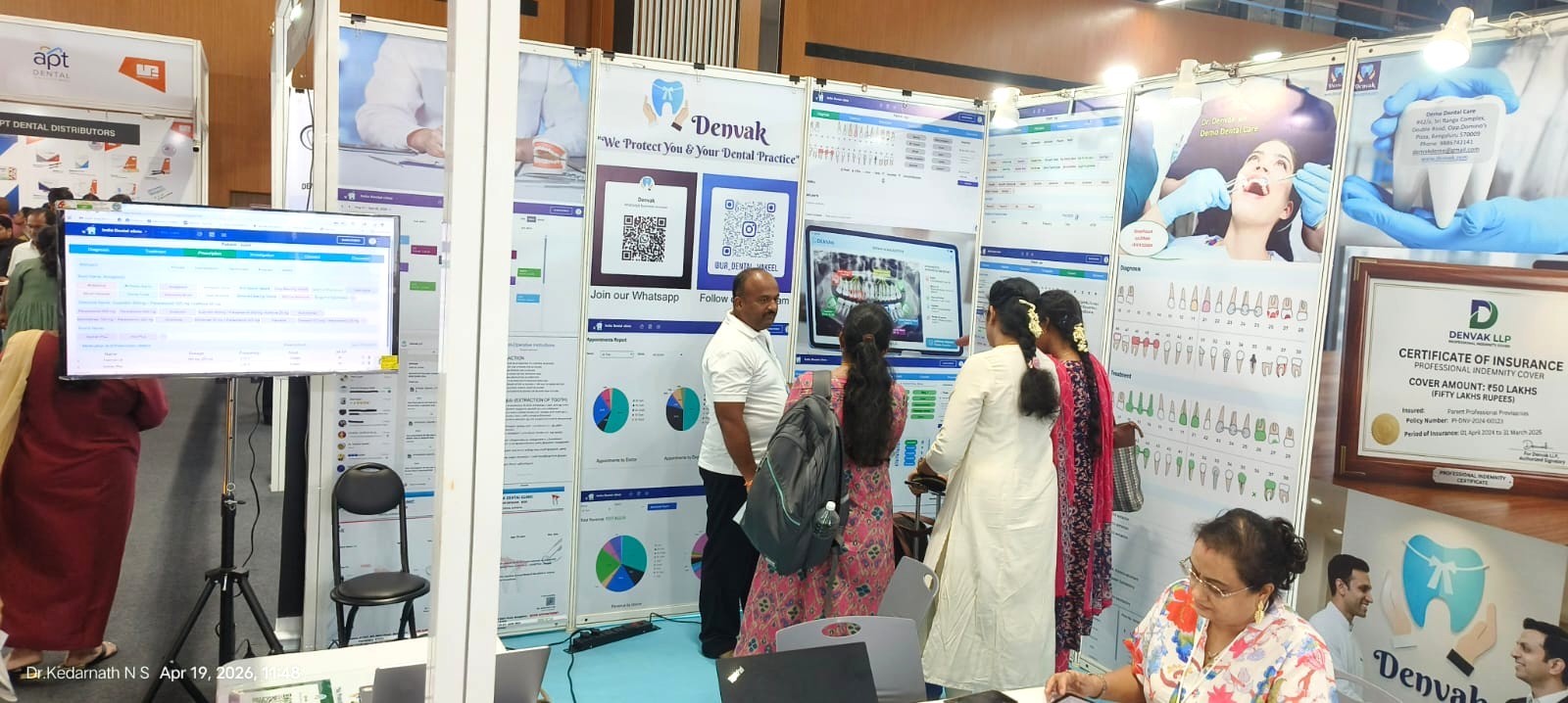Dental delegates visiting Denvak booth at Expodent Chennai 2026 with software display panels
