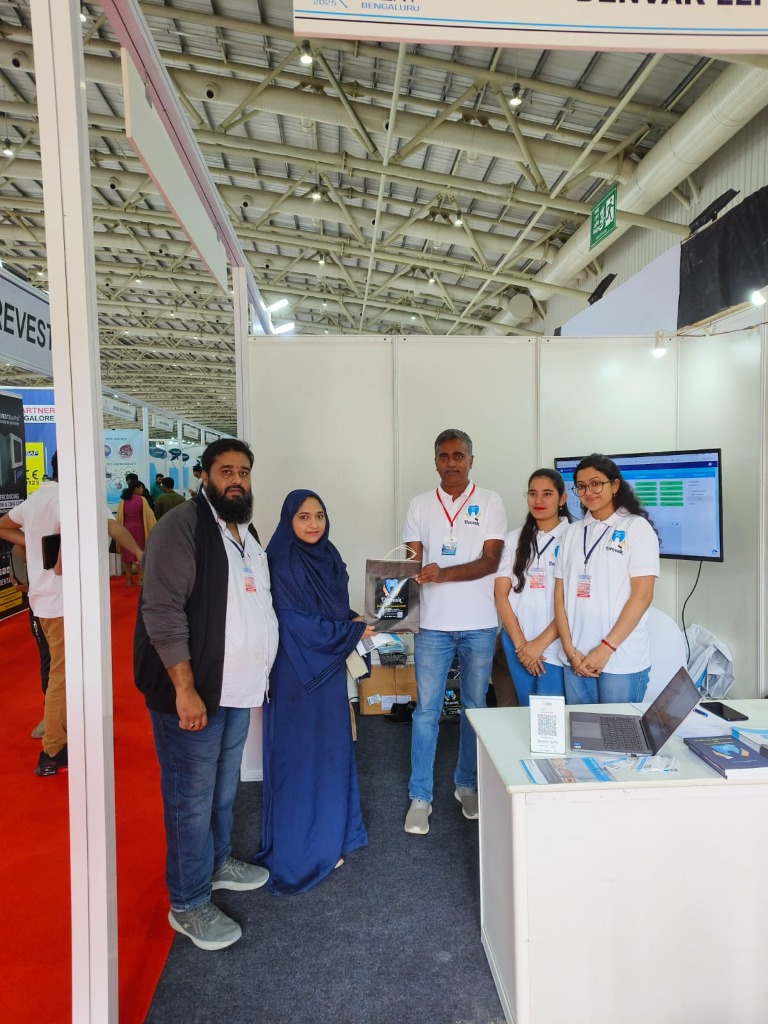 Dental delegates visiting Denvak booth at Expodent Bengaluru and receiving a demo kit